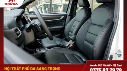 Nội thất phủ da sang trọng từ ghế ngồi, cần số, táp pi cửa đến bệ tỳ tay (L)